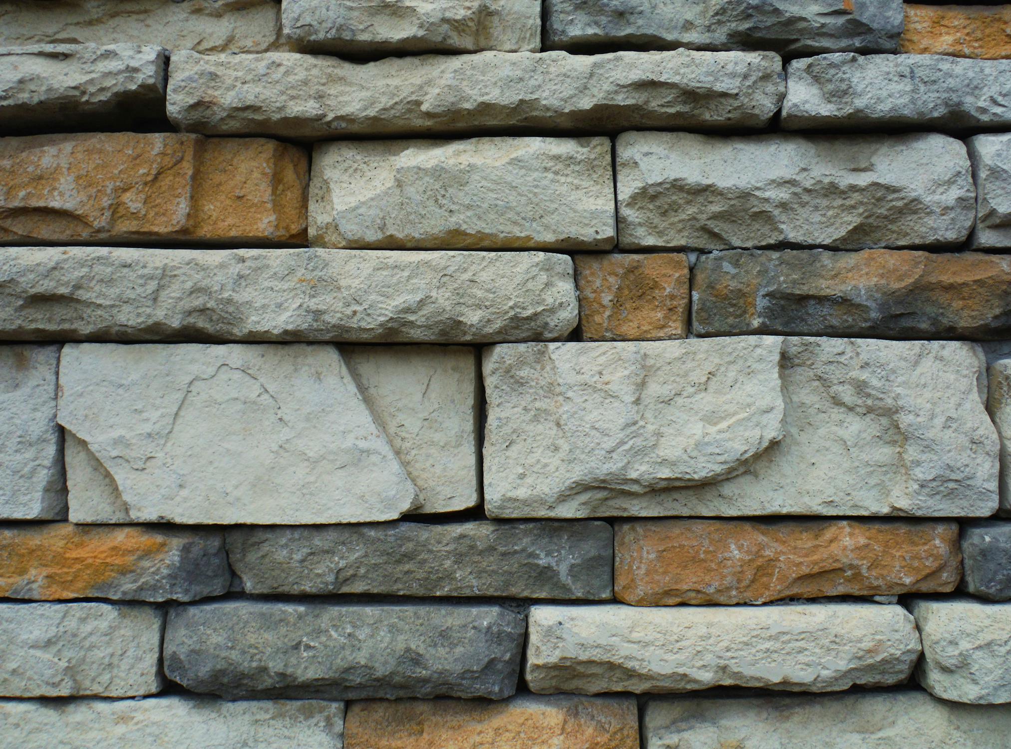 Restored stonework on a traditional terraced house in Cardiff, showing expert masonry craftsmanship and attention to detail with clean, preserved stone surfaces.